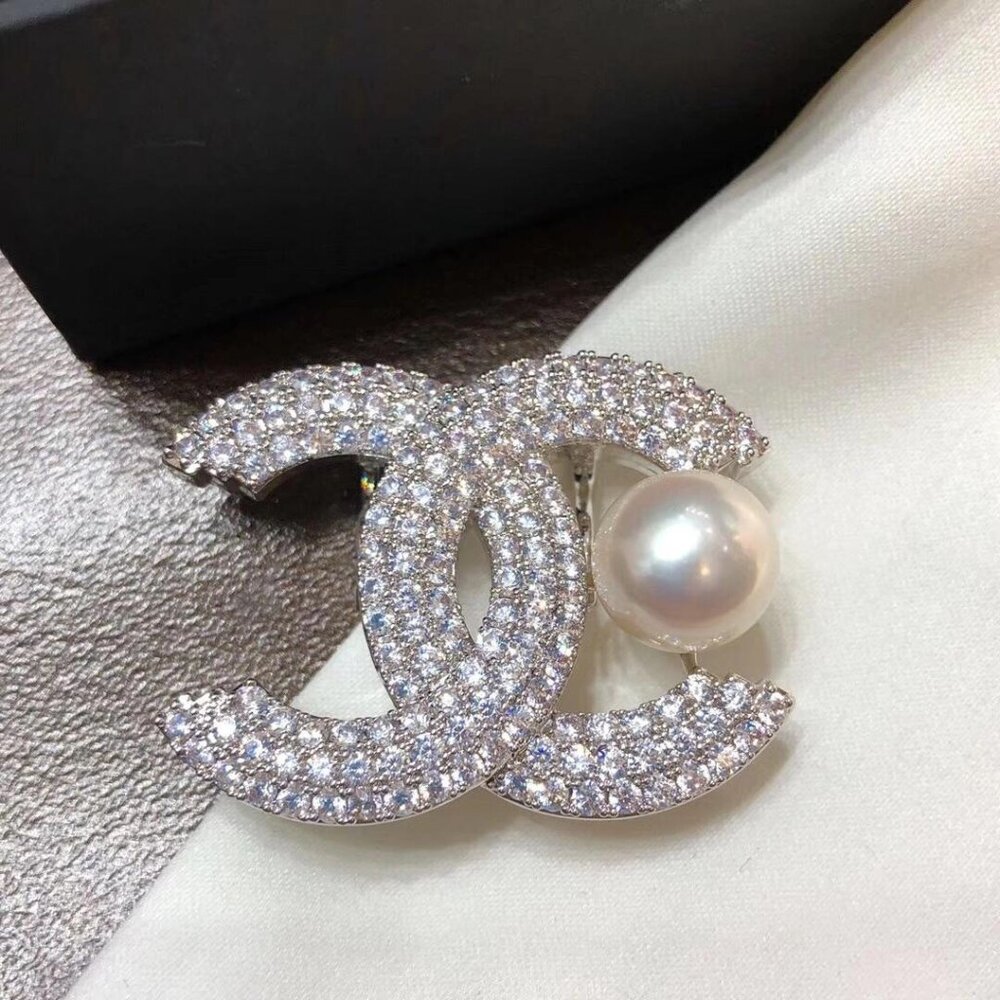 Chanel diamond brooch